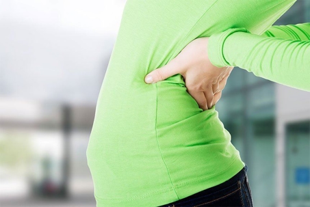 Woman stretching her back