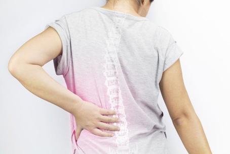 Woman suffering from spondylosis